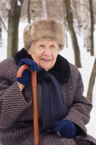 Portrait of the old woman in the winter